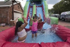 WaterSlide Rentals kids playing in the attached pool