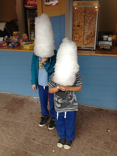 children eating cotton candy