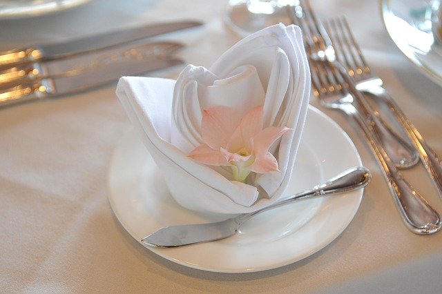 wedding napkin folded with a flower