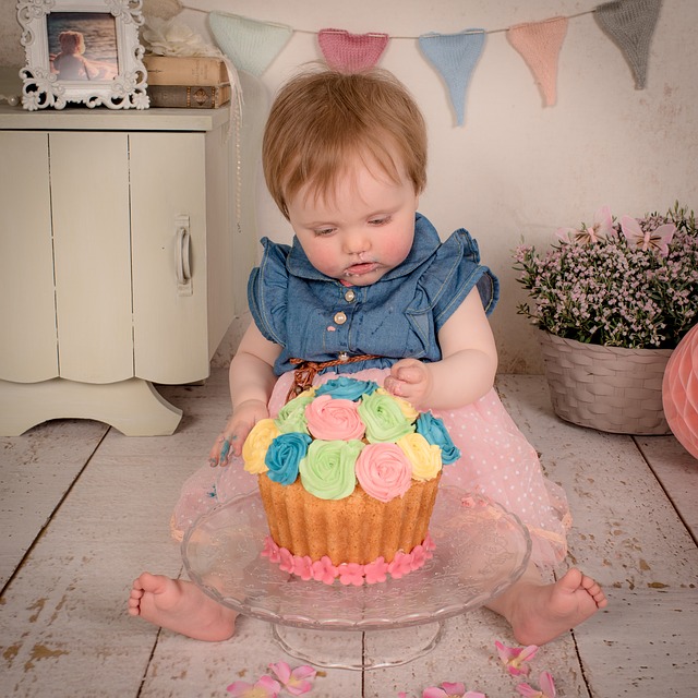 Baby eating cake